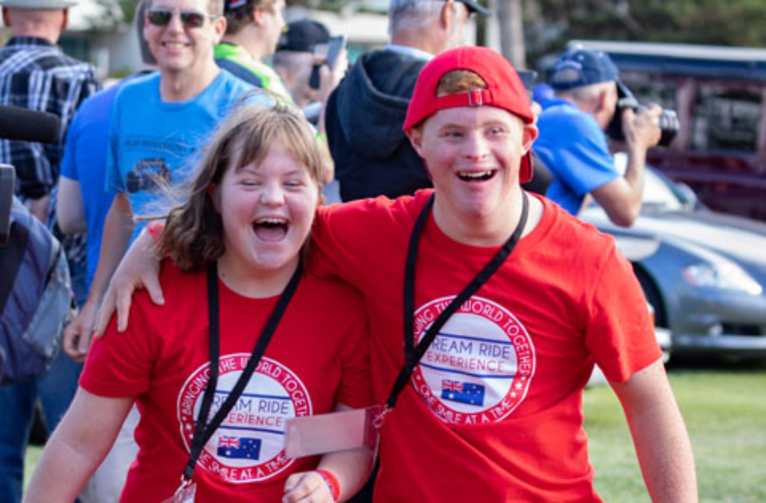 Dream Ride community participants and supporters smiling together